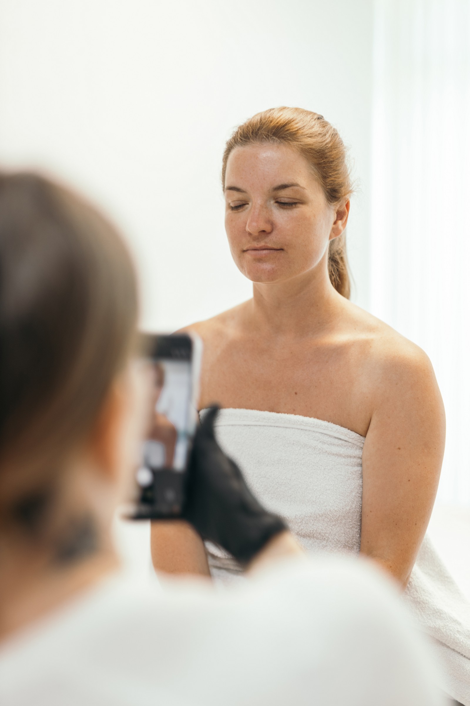 A “before” photo ahead of a facial — brand content for a clinic, Brussels
