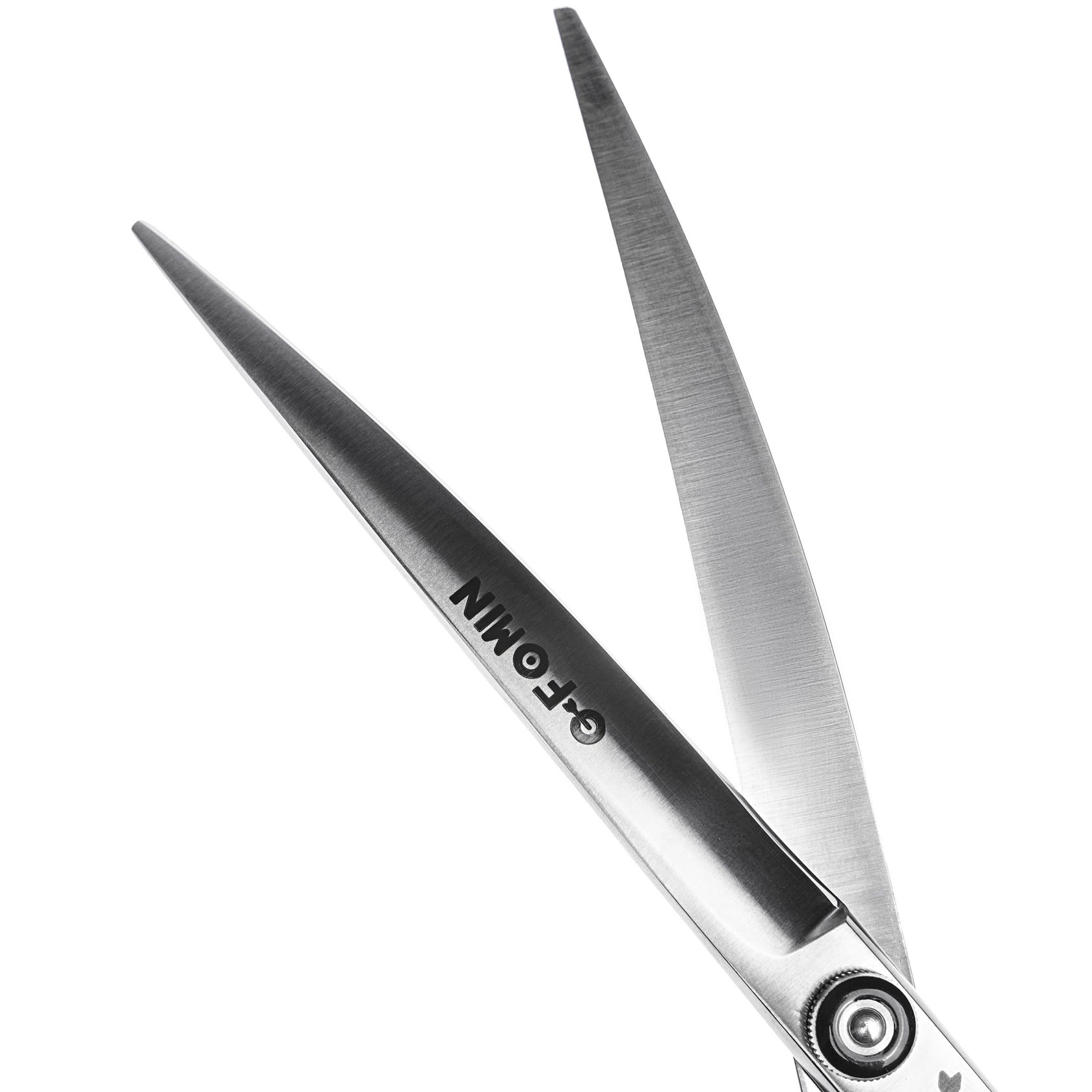Open professional hair scissors on a white background