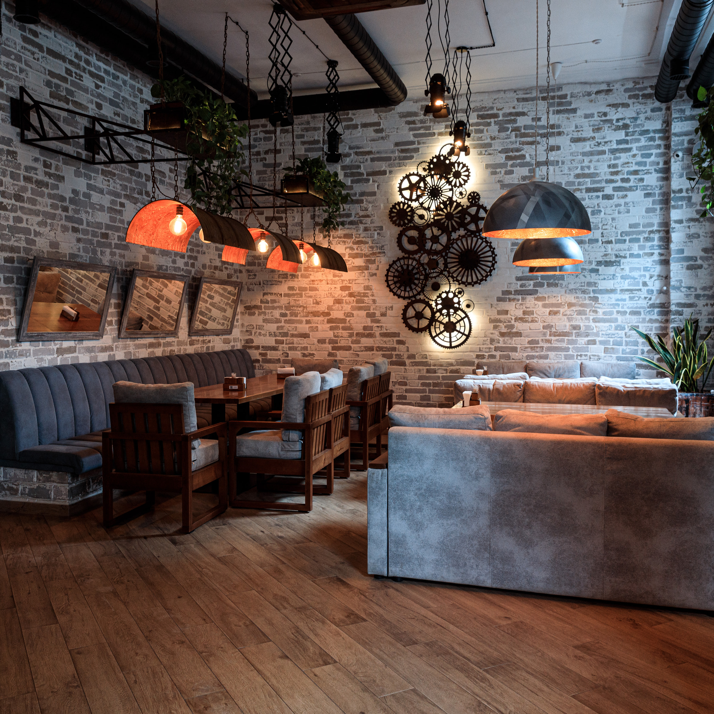 Dining room with sofas and brick walls — Interior Photography, Brussels